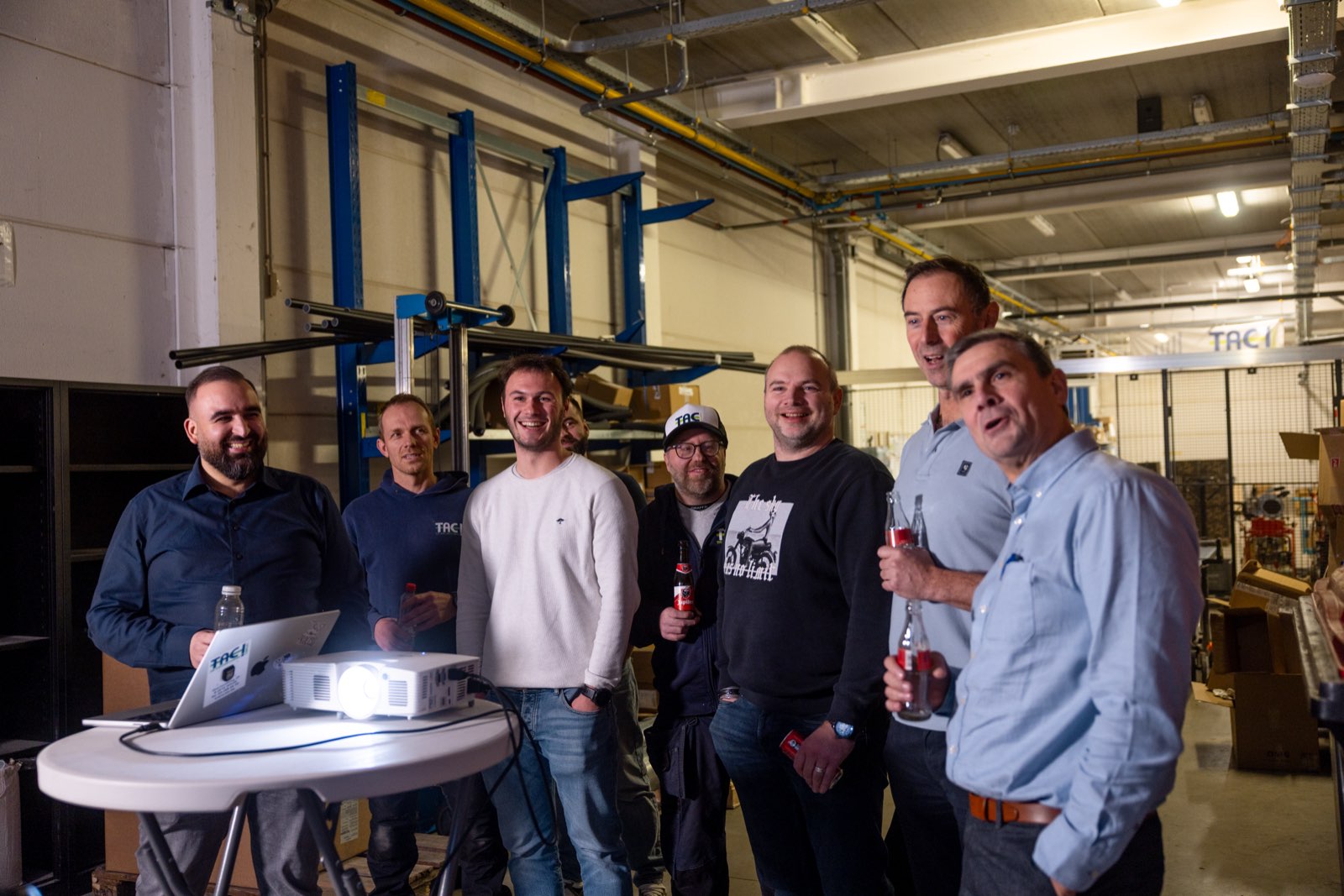 Het TAC-team samen tijdens een interne bijeenkomst